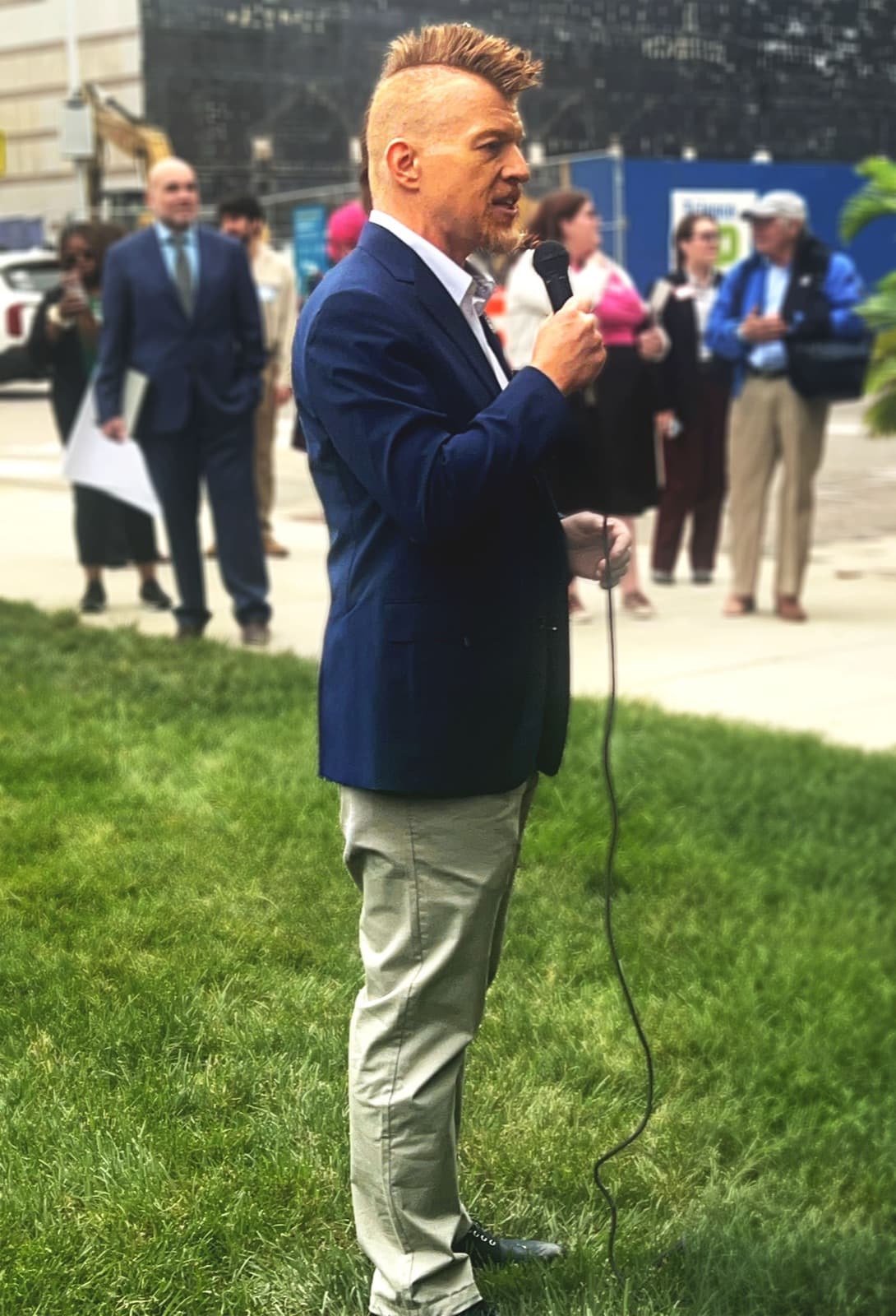 Shane Lukas speaking at the state capitol