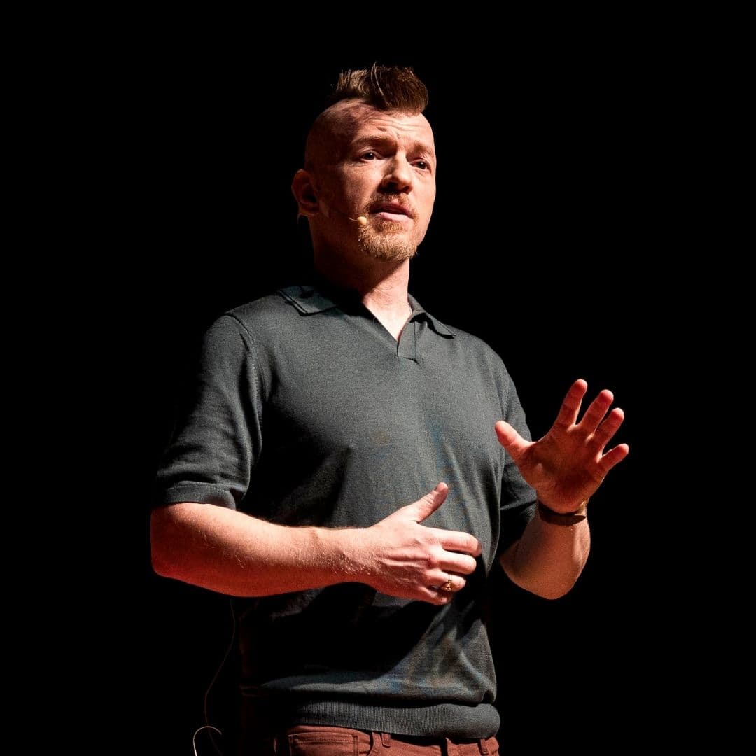 Shane Lukas on the TEDxNormal 2026 stage